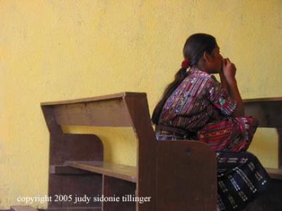woman in church, solola, guatemala