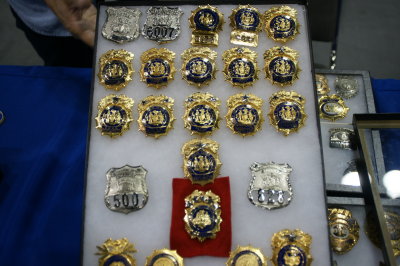 Replica NYPD  badges, officers known to have duplicates shield bought in NY Chinatown.