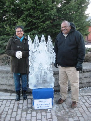 Mom and Dad by an ice sculpture