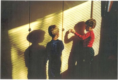 Two boys playing with shadows - 2 x 2 ?