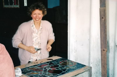 Jasmine Repairing the Stained Glass Window to the Caravan on a Later Trip