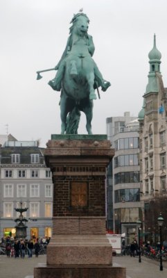 Man On Horse With Axe
