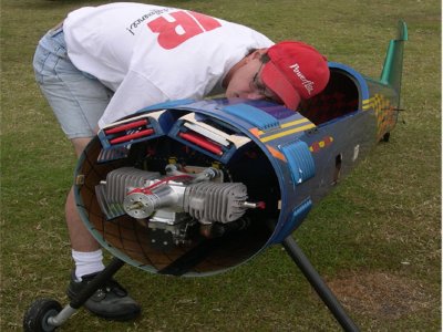 No he is NOT hugging the aircraft