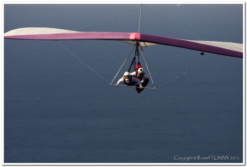 Hang Gliding Over Pacific Ocean