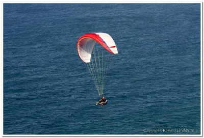 Parasailing over pacific ocean