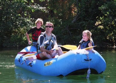 John, Ben, and Gina Daly on the American River