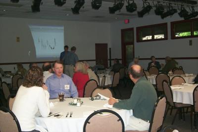 Don Kroodsma and Ed Talbott prepare for Kroodsma's presentation