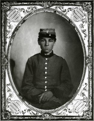 wYounger Soldier sitting in frame p.38.scan.jpg
