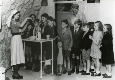 Kids watching demonstration p.102-103.jpg