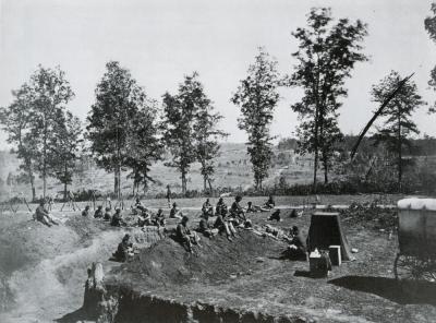 wSoldiers sitting outside Trenches p.V.scan.jpg