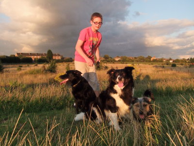 John, fronted  by  Max, on  lhs, Lady, in  centre  and  Edward, on  the  rhs.