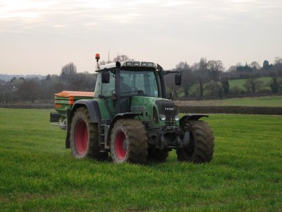 A  neat  tractor  at  work  in  the  fields.