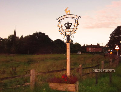 Dawn  at   the  village  sign.