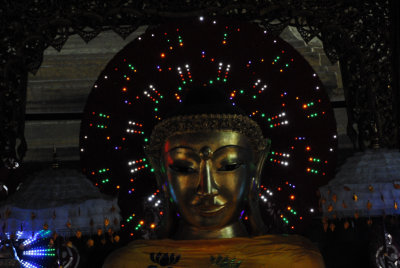 Flashing lights behind the head of Buddha...