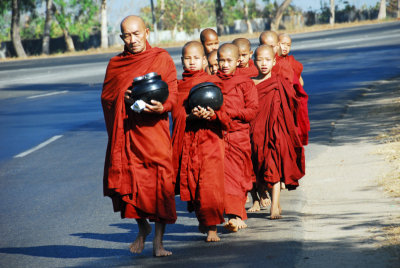 Monks on their morning walk to gather food donations.