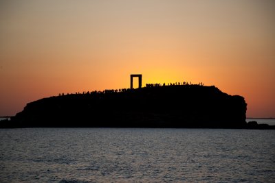 Tourists watching sunset at Naxos