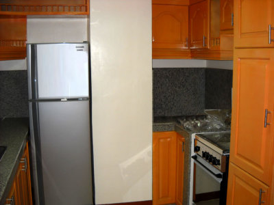 kitchen ref and stove area.jpg