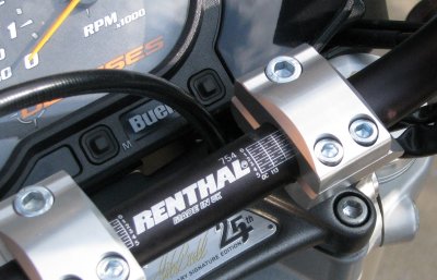 Renthal handlebars and ROX 2 bar risers.