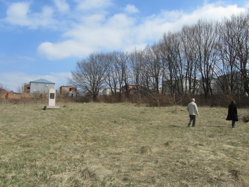 early April, at the new Jewish cemetery at the north end of town