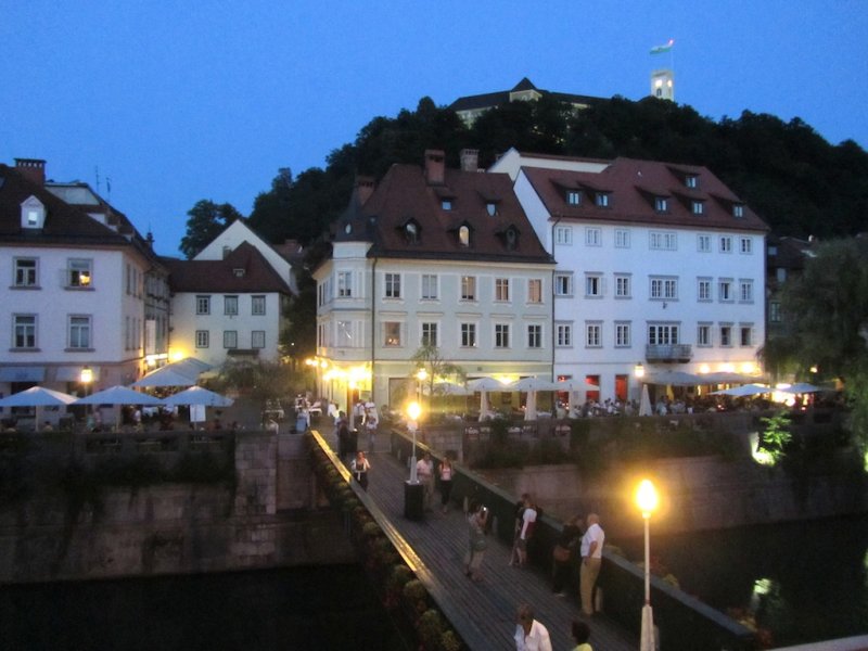 a view toward the Cobblers Bridge as night falls