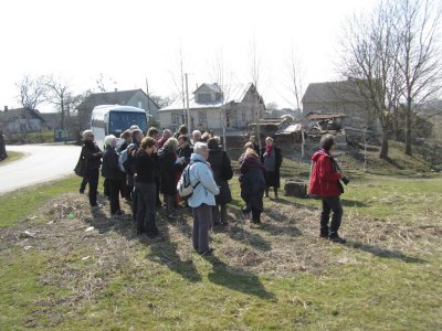 the group exits the bus at an ancient Jewish cemetery