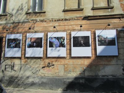 a photo cafe in old town created a street gallery
