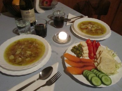 sour cucumber soup with chicken, smoked fish with cabbage and veggies