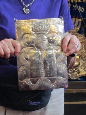 an unusual torah shield, with the emblem of the Swedish monarchy