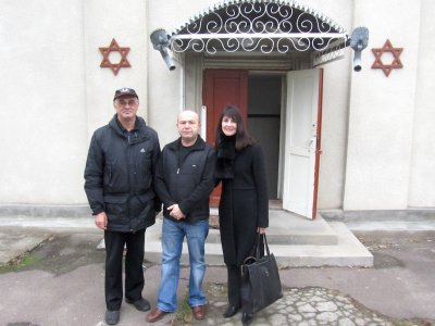 he is a prominent local businessman, and looks after the Jewish buildings and cemetery