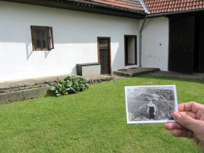 a picture of the house with his son, from soon after his purchase