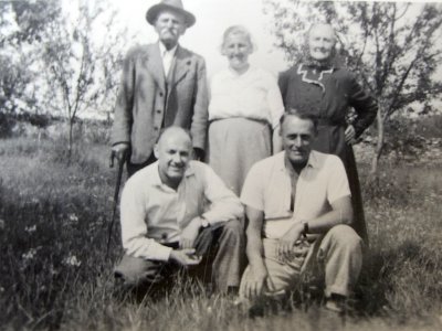 a family group with her grandparents, and at front right her father Frantiek Polvka