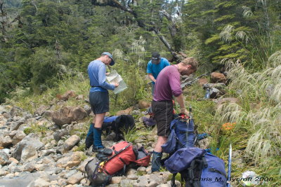 Packing up after lunch - Aaron, Dave, and Roy