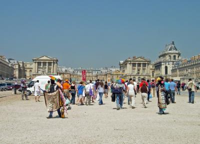 Souvenir vendors hang out outside the palace to prey on unsuspecting tourists.