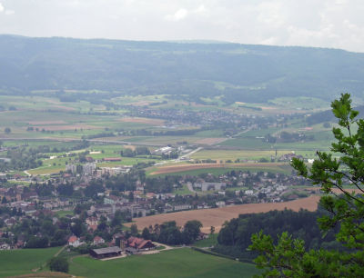 Looking towards Courttelle - it's just above and to the right of the picture's center.