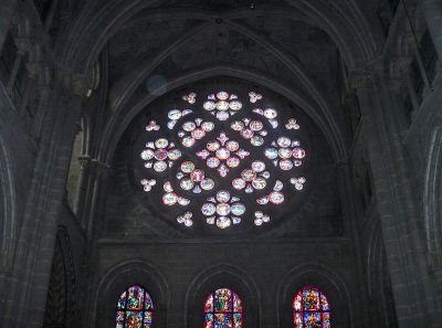 The only surviving medieval glass, in the southern rose window.