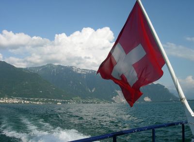 The Swiss flag, flying over the back of the boat.