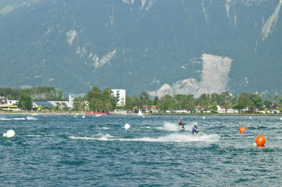 Jetskiers racing a slalom course near Villeneuve.