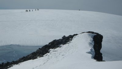 skiers on the south Nuken top