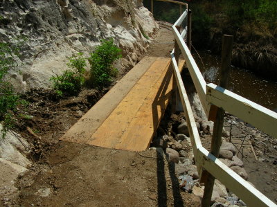 On Monday July 31, BTA Staff did a great job fixing up the washed-out part of the main trail by the catwalk