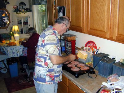 01 Jerry fixing breakfast.JPG