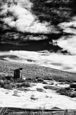 _DSC5883 Outhouse with clouds Bodie reduced.jpg