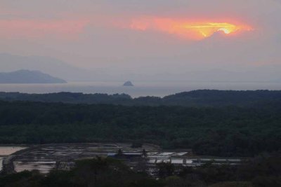 Nicoya Sunset (solar salt farm in foreground)