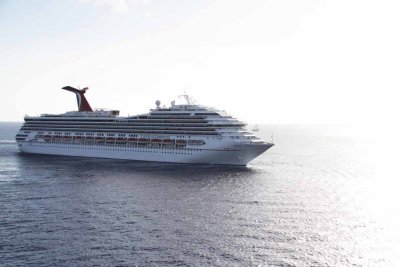 The Conquest weighs anchor, turns on a dime and sails for Cozumel