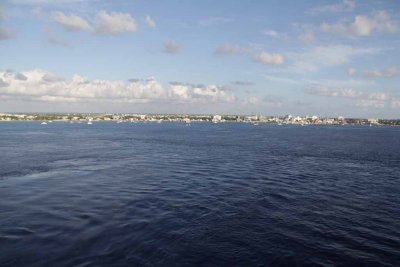 Grand Cayman recedes in the wake