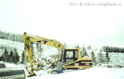 Cat 312BL at  Vail  Winter of 1997