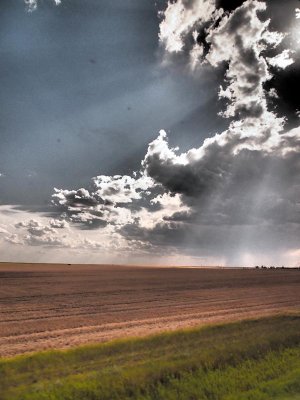 Clouds gather over the plains on this hot day.