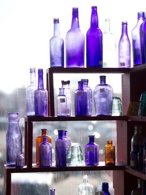 antique bottles in the window.