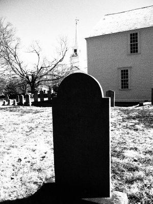 Neighborhood w/ cemetery, meeting house and church.