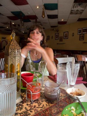 pensive over the table.