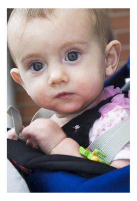 Lorelei at 10 months, is just a bit 'strange' with us, but cute as a button!